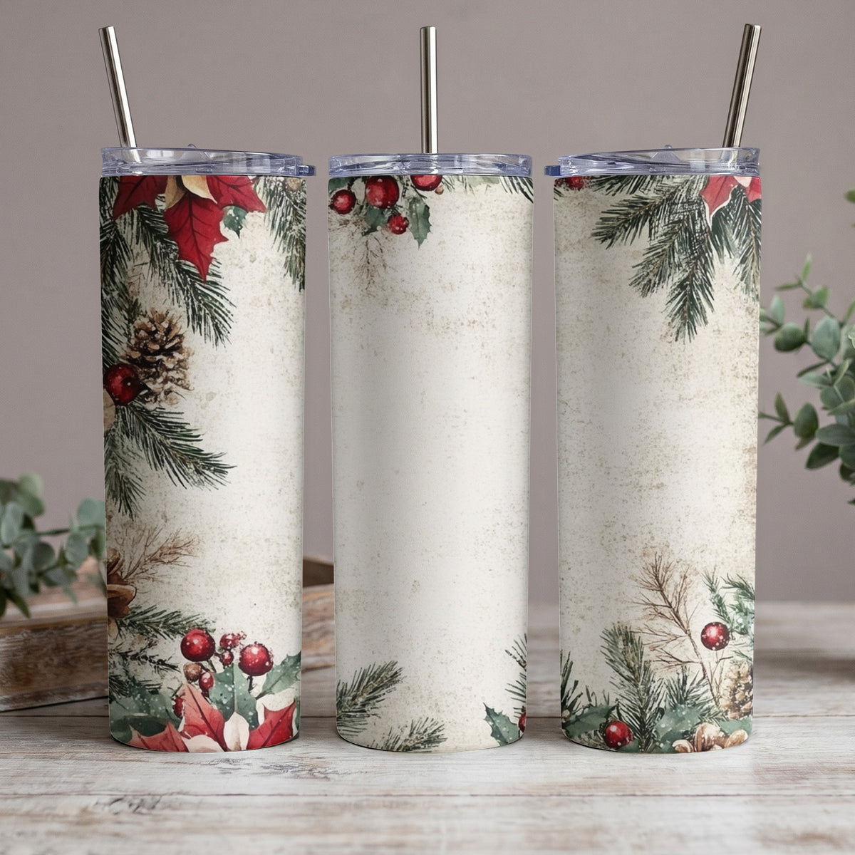 Three tumblers with a rustic Christmas floral and pine branch design.