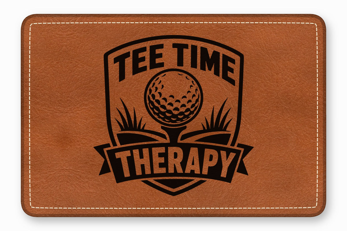 Brown leather patch with rounded corners featuring a black engraved Tee Time Therapy golf crest.