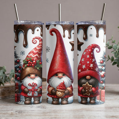 Three gnomes with festive hats, holding gifts and treats, on tumblers with chocolate drips.