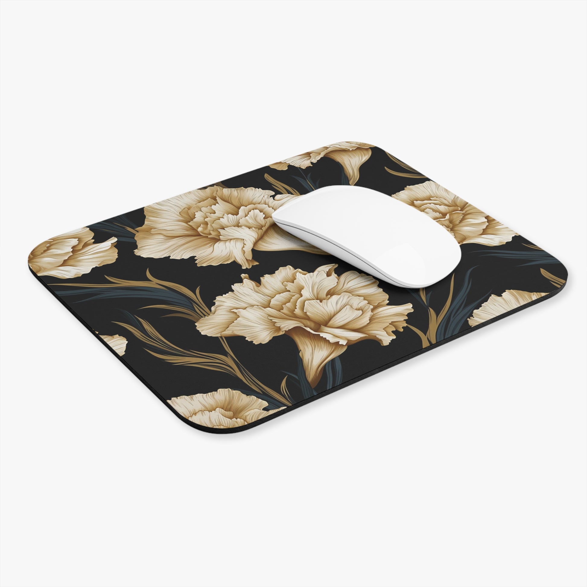 Mousepad with a dark floral pattern and a white computer mouse.
