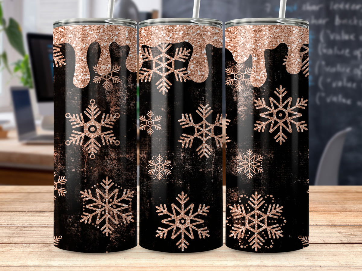 Black tumbler with rose gold glitter drips and snowflakes.