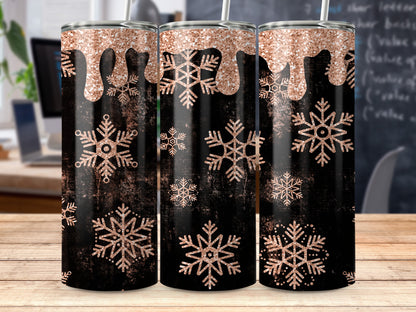 Black tumbler with rose gold glitter drips and snowflakes.