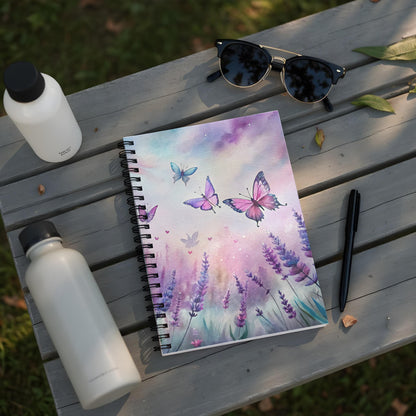 Spiral-bound notebook with a watercolor painting of lavender and butterflies.