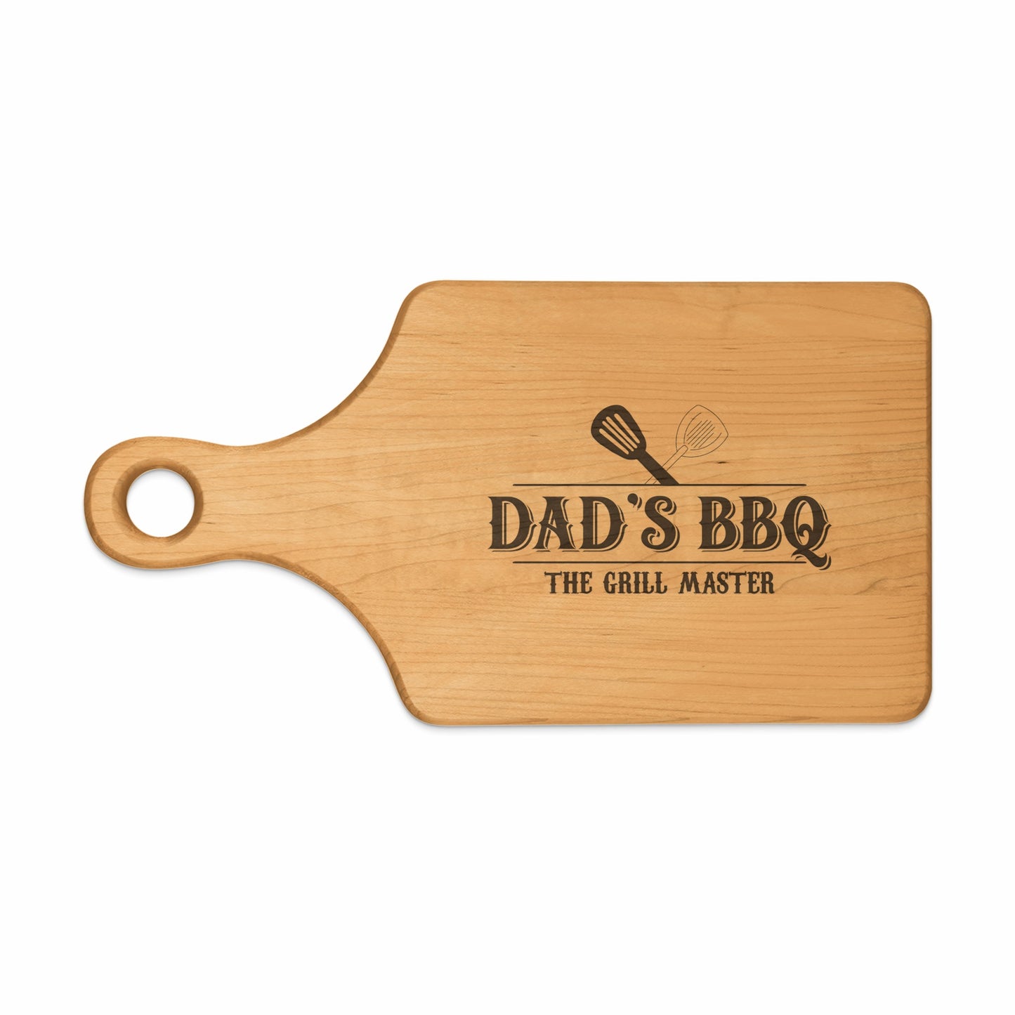 Wooden cutting board with "Dad's BBQ The Grill Master" text and grill utensils.