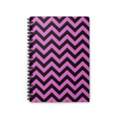 Spiral bound notebook with a pink and black chevron pattern.