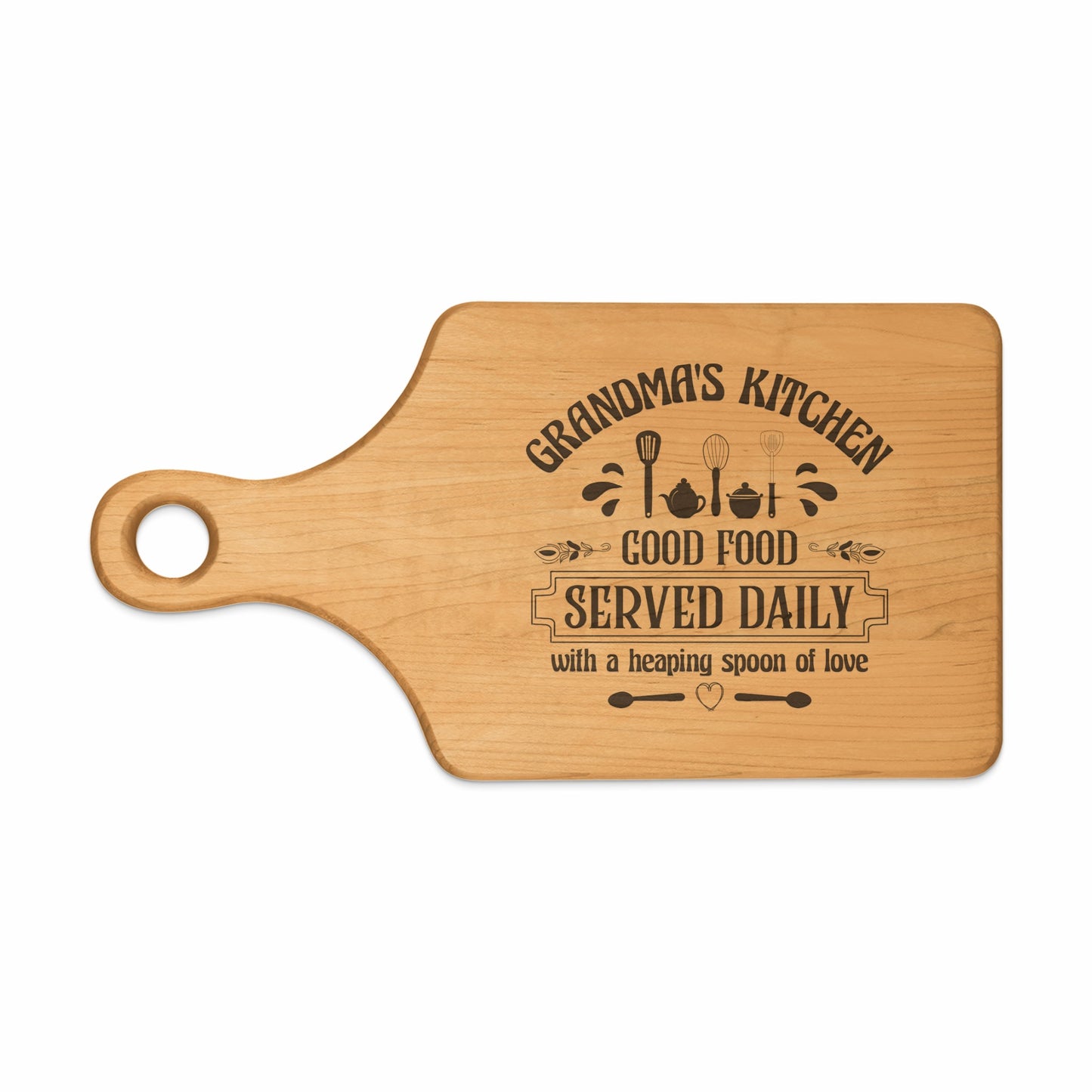 Wooden cutting board with "Grandma's Kitchen Good Food Served Daily" engraving.
