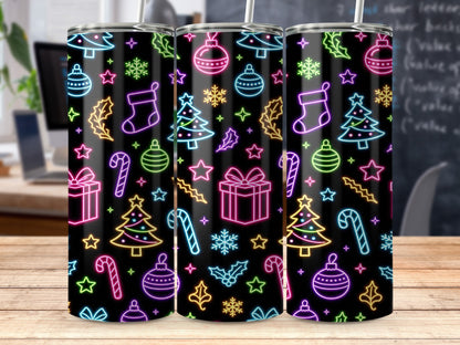 Black tumbler with neon Christmas icons: trees, stockings, ornaments, candy canes, and gifts.