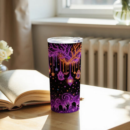 Tumbler with a spooky Halloween design featuring ghosts, bats, and a graveyard.