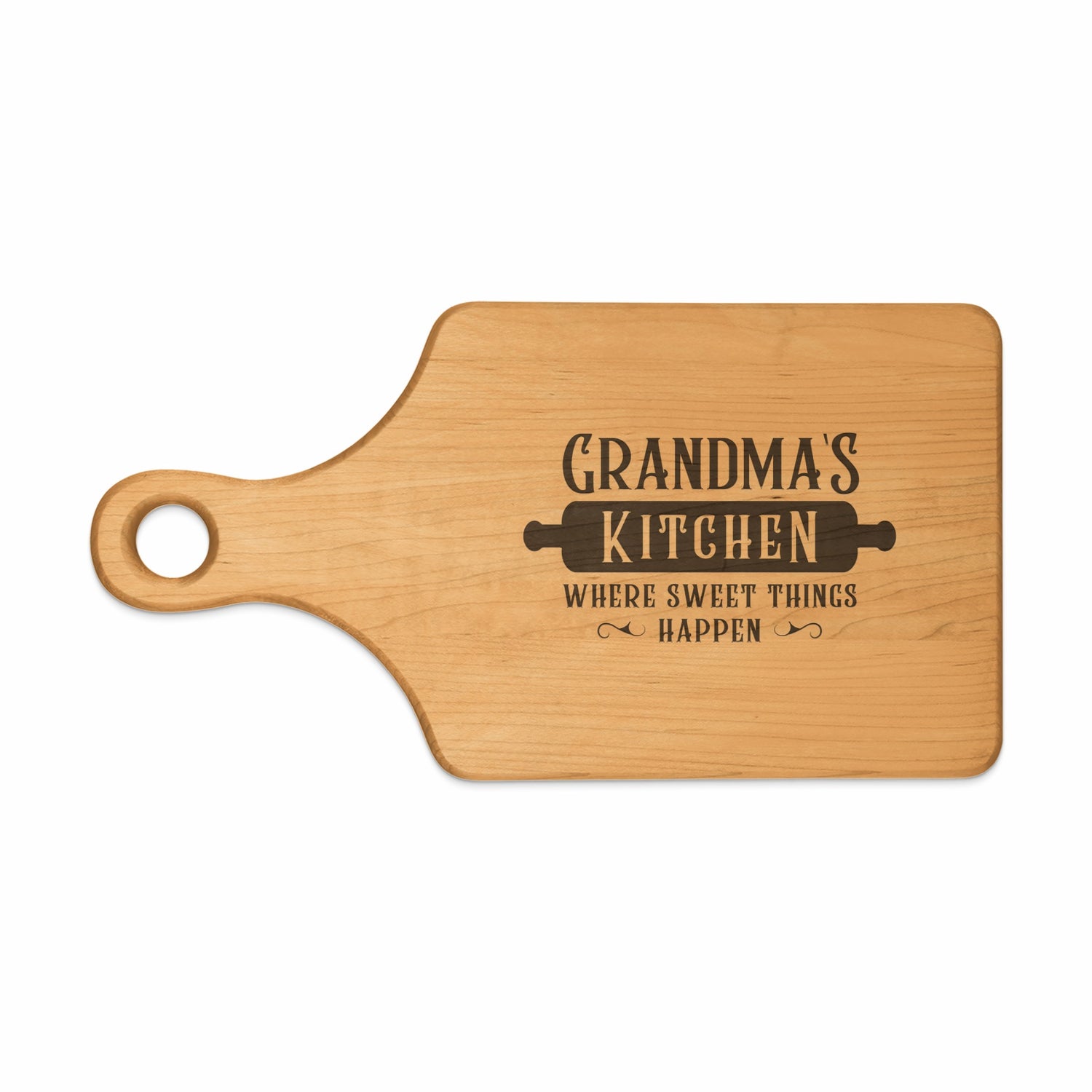 Wooden cutting board with "Grandma's Kitchen Where Sweet Things Happen" text and rolling pin graphic.