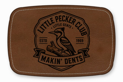 Brown leather patch with rounded corners, white stitching, and a black woodcutter emblem featuring a bird.