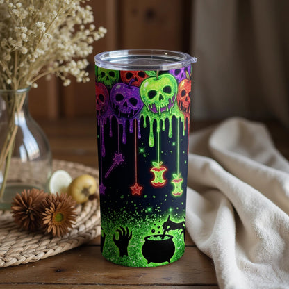 Tumbler with dripping skull apples, stars, and cauldron graphic design.