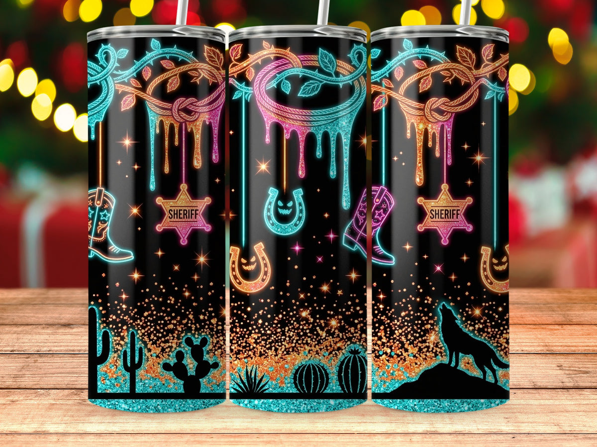 Three tumblers with western and spooky designs, including cowboys, sheriffs, and wolves.