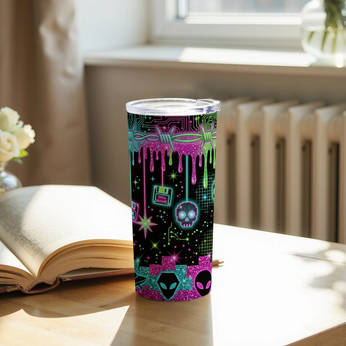 Tumbler with neon 90s cyberpunk design featuring aliens, skulls, and floppy disk.
