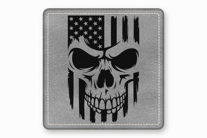 Square grey leather patch with rounded corners, featuring a black distressed skull and American flag design.