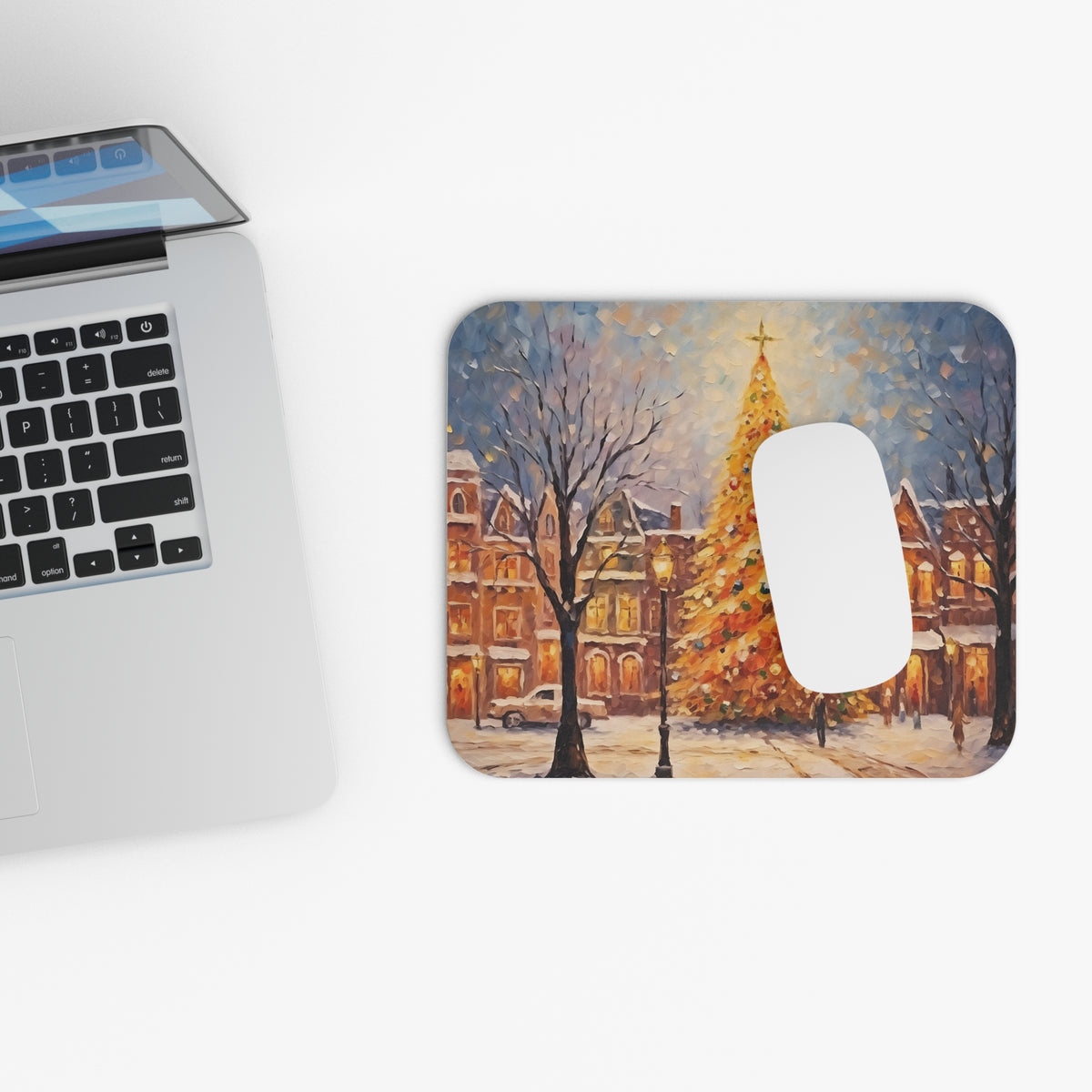 Mousepad with oil painting of a snowy street at night with Christmas tree.