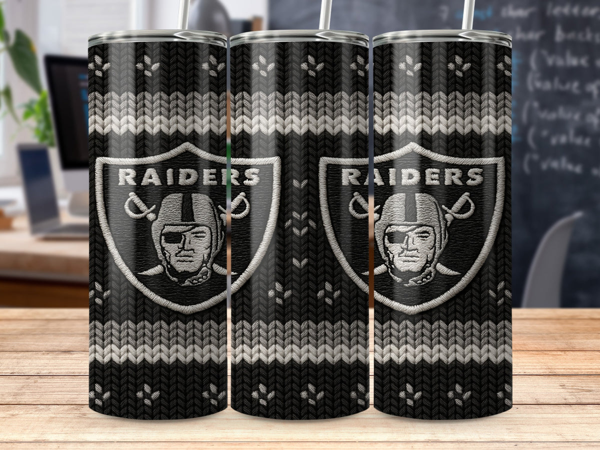 Black and white Raiders logo on a tumbler with a knitted pattern.