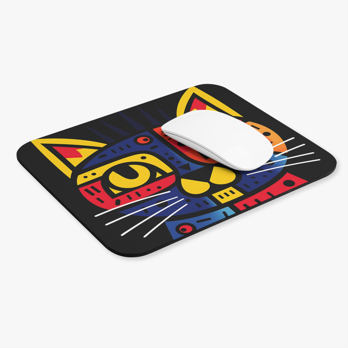 Mousepad with abstract colorful cat face design and a white computer mouse.