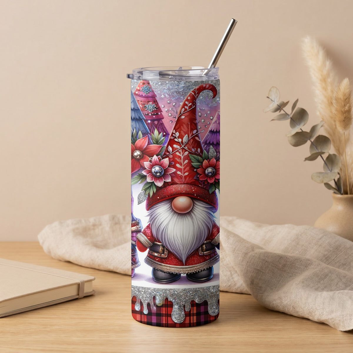 Tumbler with a Christmas gnome design and a silver straw.