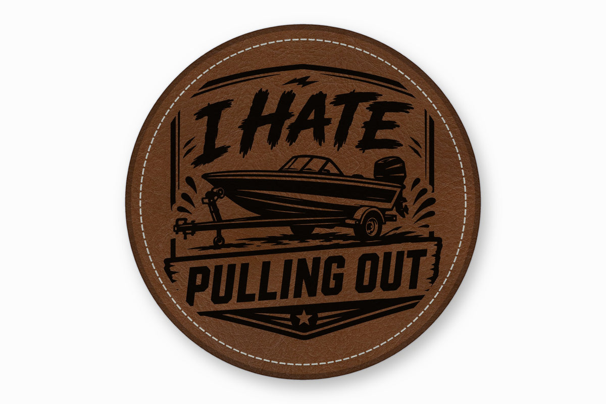 Round brown leather patch with white stitching featuring a motorboat graphic and text reading I HATE PULLING OUT.
