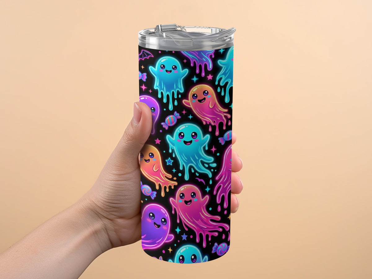 Tumbler with a cute Halloween ghost pattern, candy, and bats.