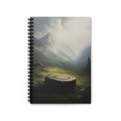 Spiral notebook with a scenic mountain valley painting on the cover.