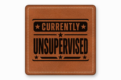 Brown leather square patch with white stitching and the black text currently unsupervised with stars.