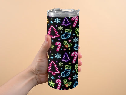 Tumbler with black background and neon Christmas icons: trees, stockings, candy canes, snowflakes, gifts, and ornaments.