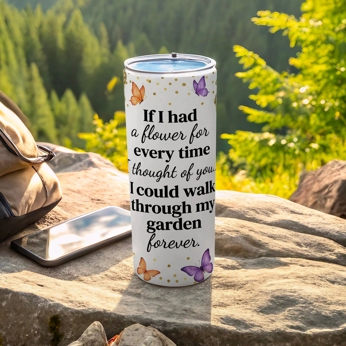 White tumbler with "If I had a flower for every time thought of you, I could walk through my garden forever."