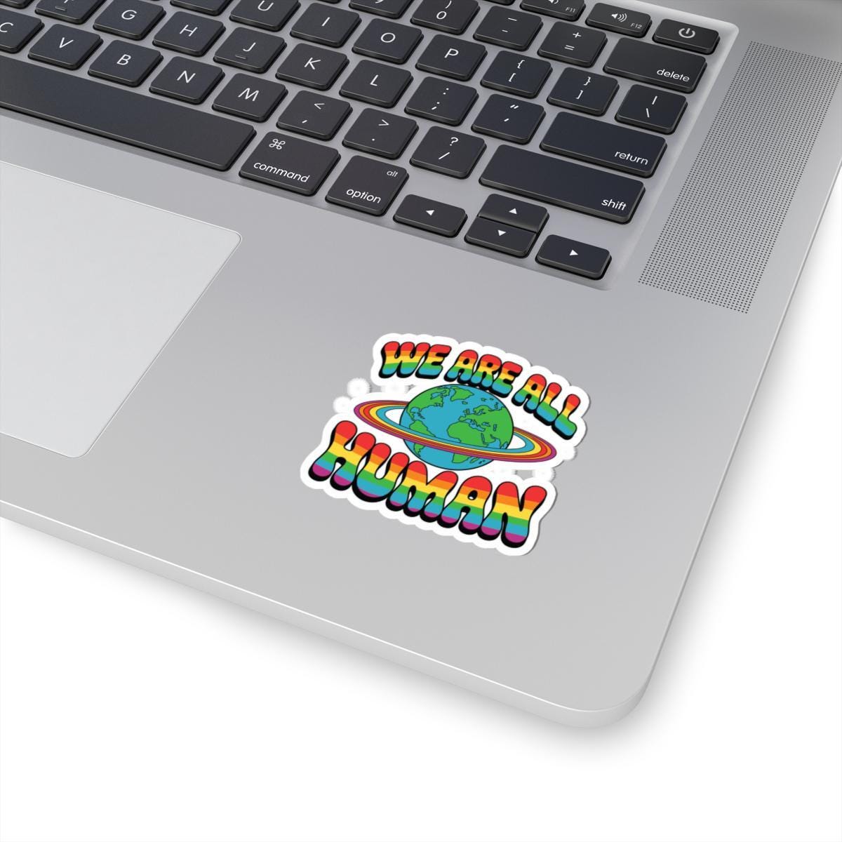 We Are All Human Pride Sticker: Rainbow Earth LGBTQ+ Vinyl Decal